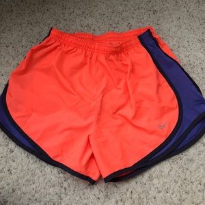 Coral and purple Nike dri-fit shorts